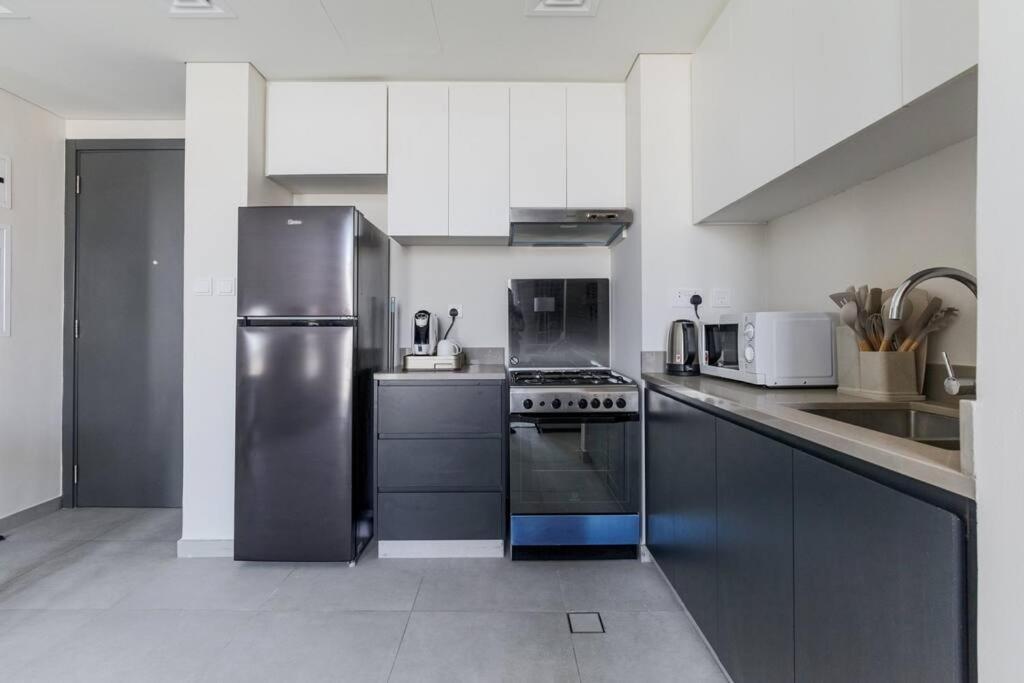 Sahab - Solo 1Br Apt In Al Jada Sharjah Buitenkant foto